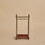 A 19th century English umbrella stand, crafted from warm toned brass, softened by time. The upright frame is formed of...