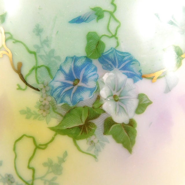 This is a Royal Rudolstat Chocolate Pot or Coffee Pot with a 1905 backstamp. The chocolate pot is white with blue trim at...