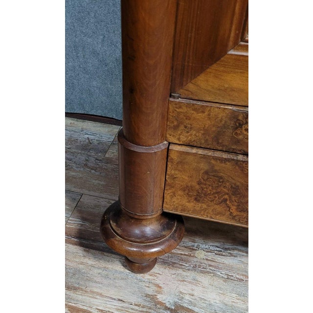 Louis Philippe period Burgundy armoire in walnut and burl, circa 1830 Opening on the front with two diamond-shaped doors...