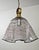 Vintage Murano glass pendant lamp dating back to the 1970s. This chandelier stands out for its craftsmanship, featuring an...