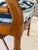 Classic American craftsmanship meets timeless chinoiserie design in this vintage Drexel Heritage faux bamboo armchair....