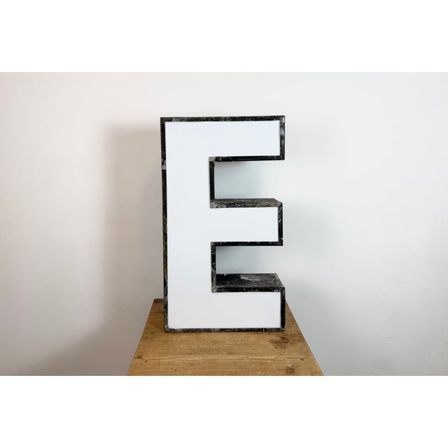 This vintage industrial illuminated letter E was made in former Czechoslovakia during the 1960s and comes from an old...