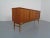 Teak sideboard, from the 1960s. Two doors with a shelf behind them. Three drawers on the left side.