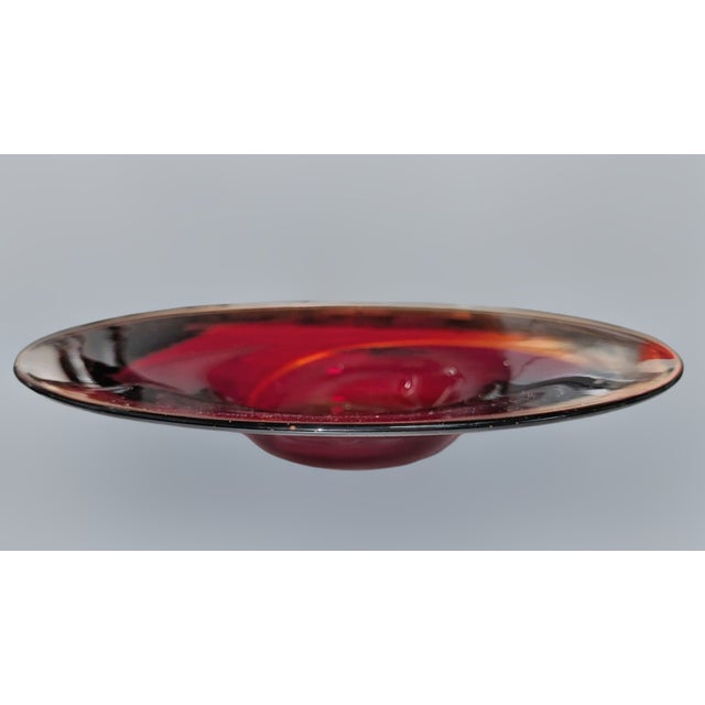 This stunning Murano glass bowl is a masterclass in mid-century modern elegance and Italian craftsmanship. Featuring a...