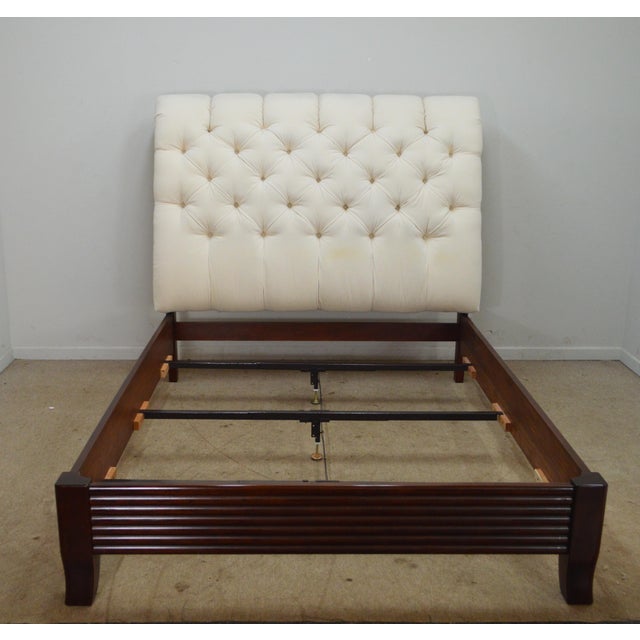 Queen Bed by Stickley. Store item #569. It features tufted headboard and reeded rails and footboard.