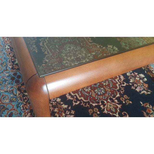 Vintage Coffee Table in Walnut, 1990s, in Flawless conditions. Designed 1990 to 1999 This piece is designed in the style...