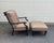 Signed Veranda diamond back aluminum chair and ottoman. Distressed black to bronze highlights. Sunbrella velcro cushions,...