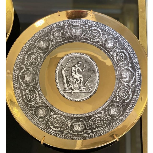 Cammei' series porcelain plates decorated with pure gold leaf, set of 6. Designed and signed by Piero Fornasetti, each...