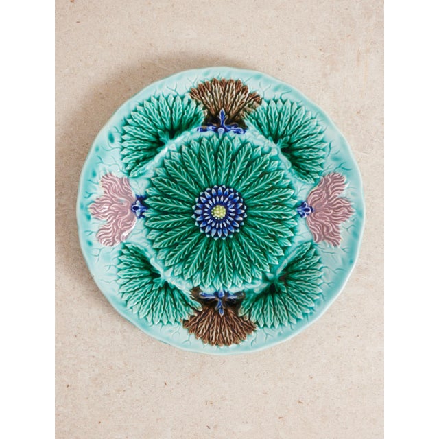 Late 1800s, early 1900s Villeroy and Boch majolica plate in with a stunning floral pattern in deep green, aqua blue, pink,...