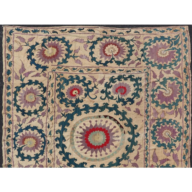 Measures: 7'0 x 8'5 Antique Uzbekistan Suzani Textile with Medallion and Floral Vine Embroidery. Keivan Woven Arts /...