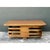 This vintage coffee table is a low, square-form design with softly rounded corners, built in the stacked rattan tradition...