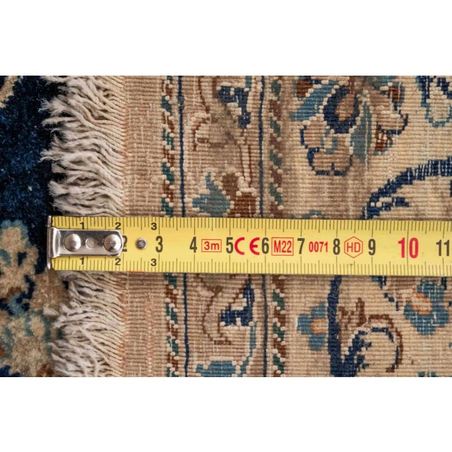 Hand-knotted rug from workshops in Nain. Beautiful light rug in a combination of cream and blue will brighten up the...