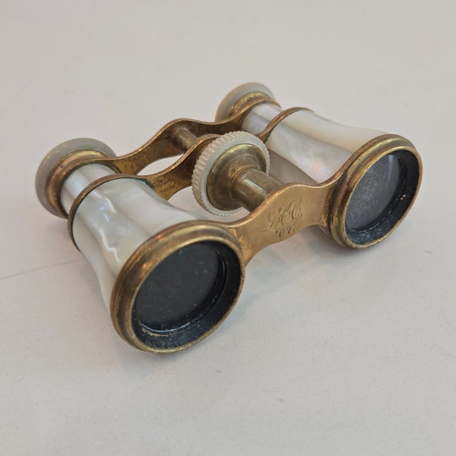 Add a touch of Belle Époque elegance to your home with this exquisite pair of antique Edwardian opera glasses by the...
