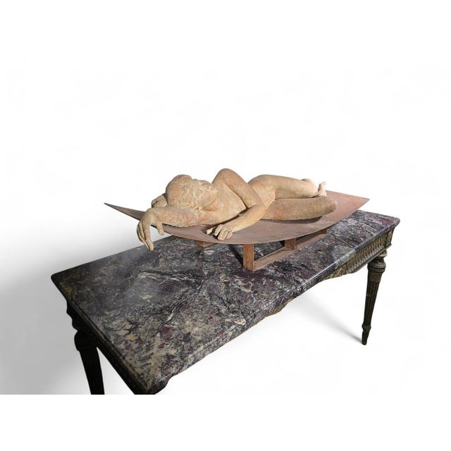 Striking large terracotta sculpture created in the 1970s, signed by the artist Mañosa. The piece depicts a reclining...