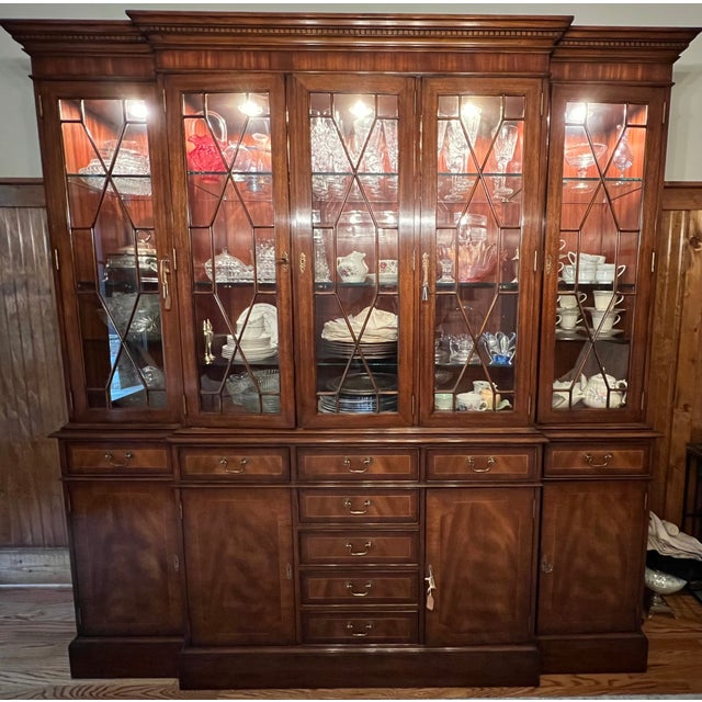 This is a new large Traditional Georgian Style Mahogany Breakfront China Cabinet/Bookcase by Leighton Hall Furniture. It...