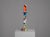 A striking abstract wood sculpture attributed to bulgarian artist ivan stoyanov. The tall, slender composition combines...