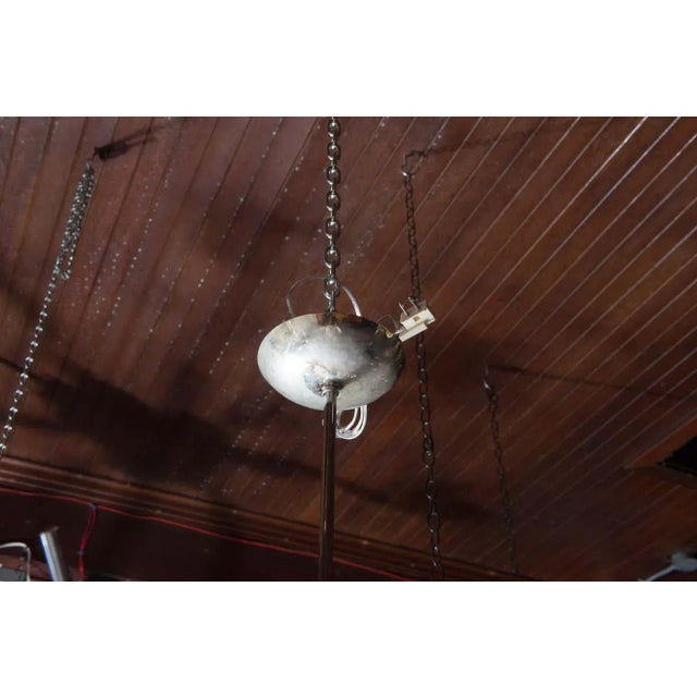 Metropolitan Opera starburst chandeliers were originally made by Hans Harald Rath of the Austrian company, J. & L. Lobmeyr...