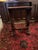 A striking set of three 19th-century Chinese export nesting tables, dating to approximately 1850–1890. Executed in rich...