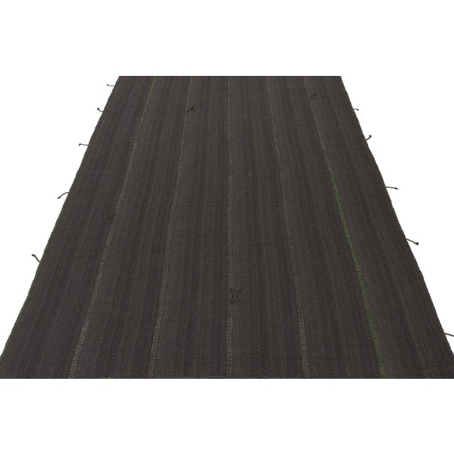 Handwoven in wool, this 10x14 Kilim is from a bold new line of contemporary flatweaves by Rug & Kilim. Further On the...