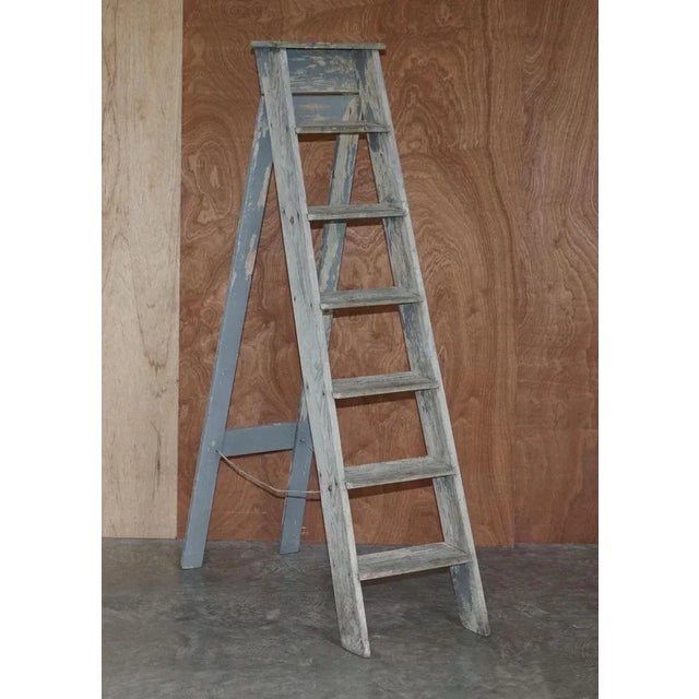 We are delighted to offer for sale this lovely original circa 1910-1920 pine painted library steps or ladder which is...