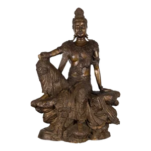 Vintage Bronze Statuette Depicting Quan Yin Seated on a Rocky Formation