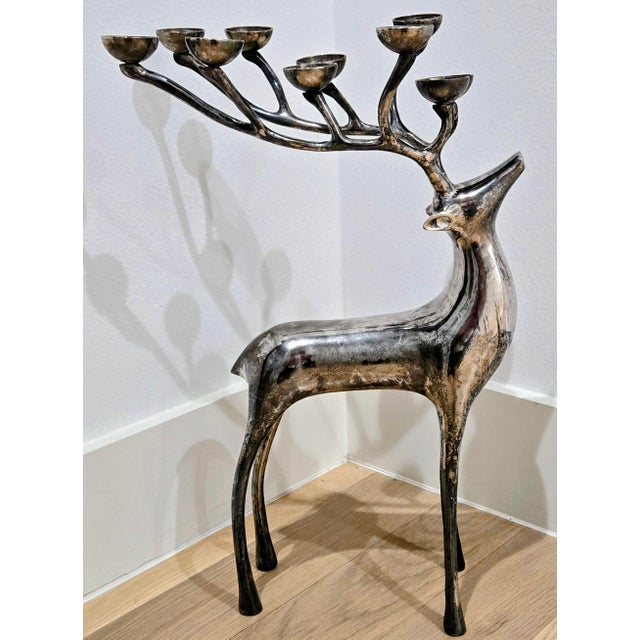 Bring sculptural, woodland-inspired glamour to a mantel, dining table, entry console, or holiday display with this...