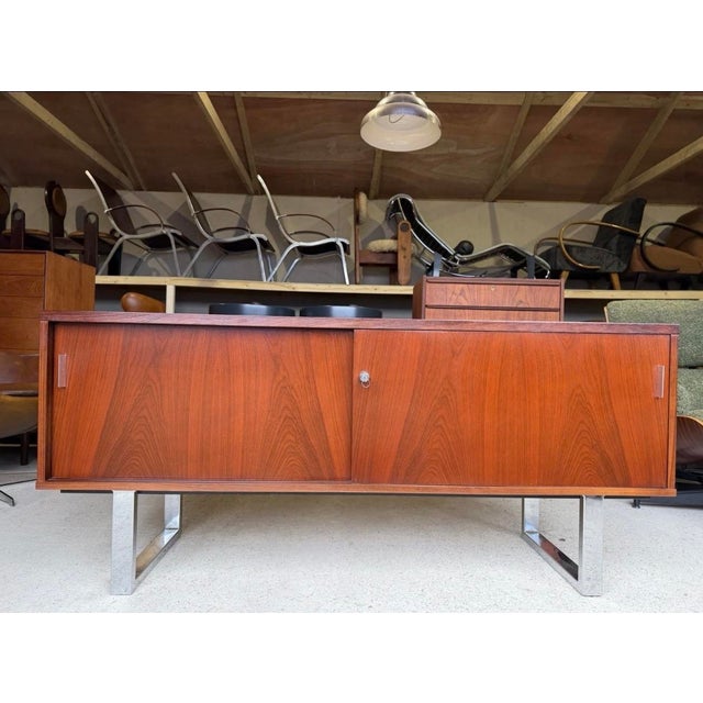 Stunning sideboard designed by Trevor Chinn and Ray Leigh for the Gordon Russell Prestige collection. Made in the mid...