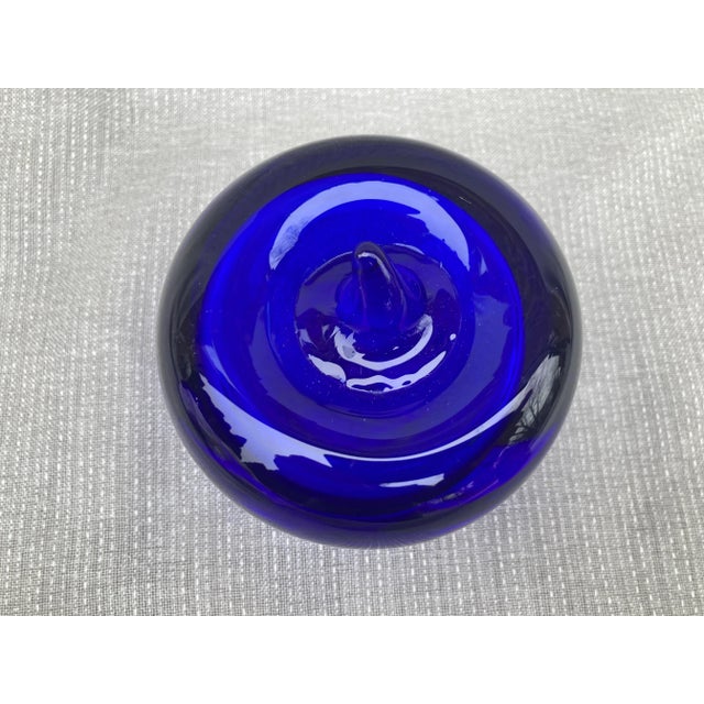 Cobalt blue hand blown glass apple paper weight. Lovely color and in great condition. No chips, or cracks. Apple measures...