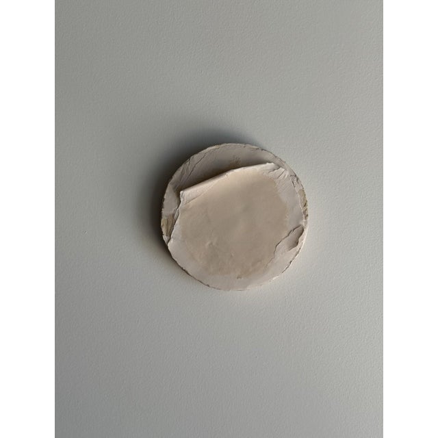 This sculptural wall work by Silvia De Marchi explores material, time, and restraint through a refined circular form....