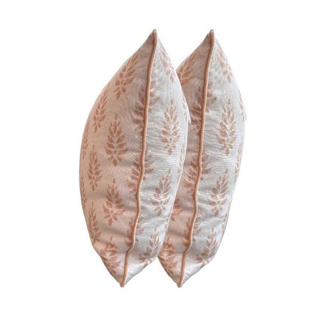 Bring warmth and charm to your space with this beautiful pair of throw pillows featuring a delicate block print botanical...