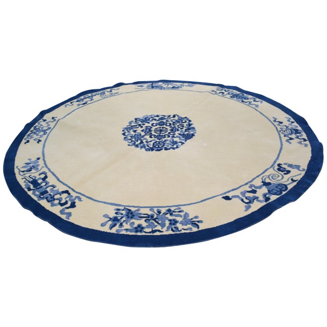 Hand-knotted with care using traditional rug-making techniques, this wool rug blends timeless craftsmanship with a modern...