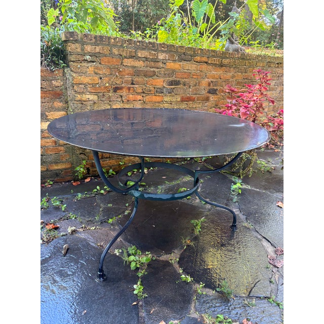 very old and very heavy, great patina and curves for days. all photos taken outside. perfect for the gardener or outdoor...