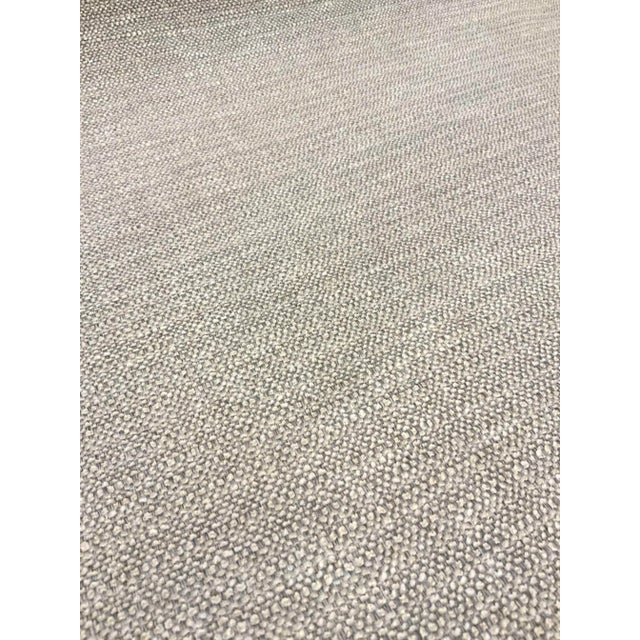 This versatile neutral fabric is gray and off-white. It is woven with a course hand and multipurpose. This fabric is a...