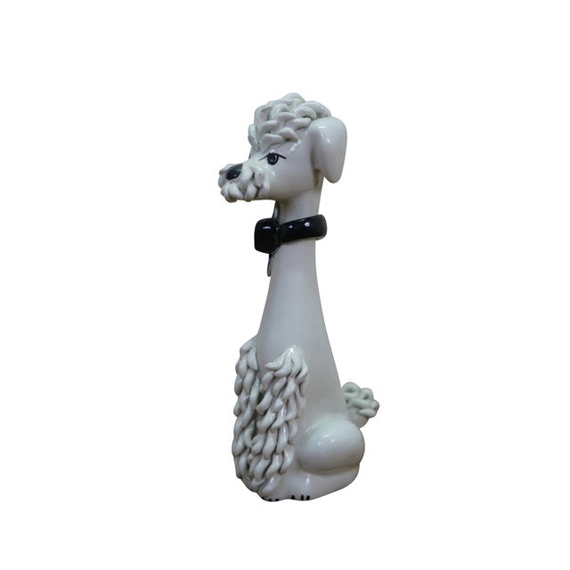 Mid century ceramic spaghetti poodle figurine, circa 1950s Italy. It features raised, textured spaghetti fur, a long...