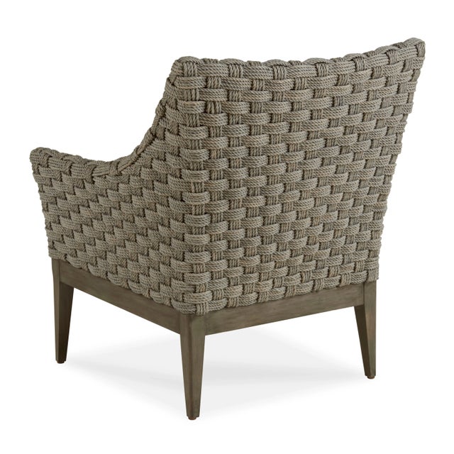 The Dafuskie is woven in Grey Abaca Rope and rests upon a complimenting grey wood base and Flax Fabric. This item is hard...