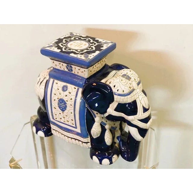 A small chinoiserie ceramic elephant side table or plant stand.A wonderful way to add a touch of In South East Asian decor...