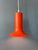 Orange mid century 'cone' pendant lamp by Raak. The shade is made out of metal and has an orange/red lacquer. The lamp...