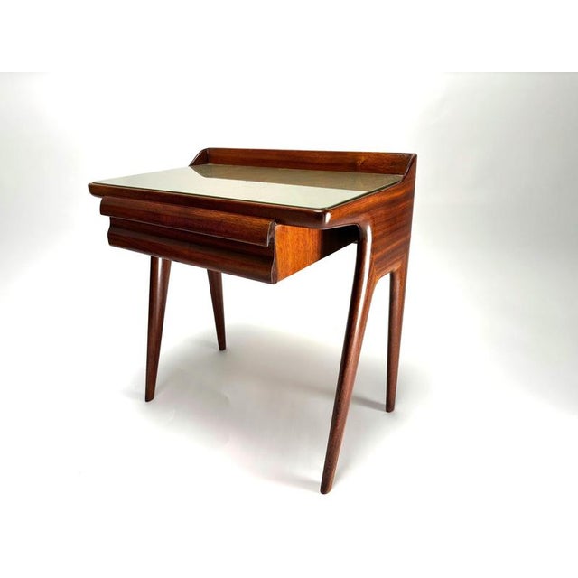 Rare pair of Mid-Century wooden bedside tables by Vittorio Dassi, Italy, 1950s The bedside tables are distinguished by...