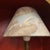 Art Nouveau style table lamp. The lamp base is made of burnished bronze, with a distinctly modernist decoration in the...