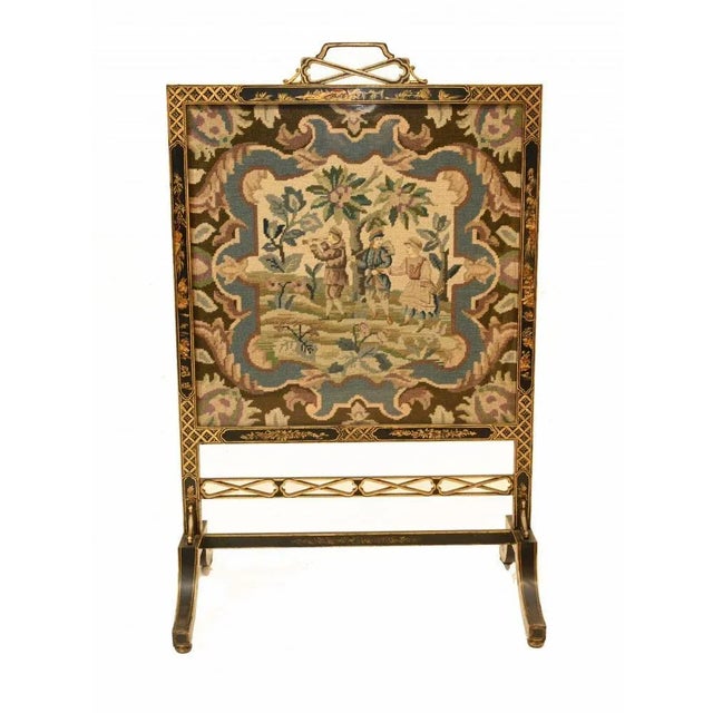 Quirky Regency lacquered screen housing a lovely tapestry. Lacquered frame features intricate hand painted Chinoiserie...