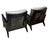 Pair of modern black lacquer chairs with silver metallic leather cushions and fur accents. Nice curved backrest detail....