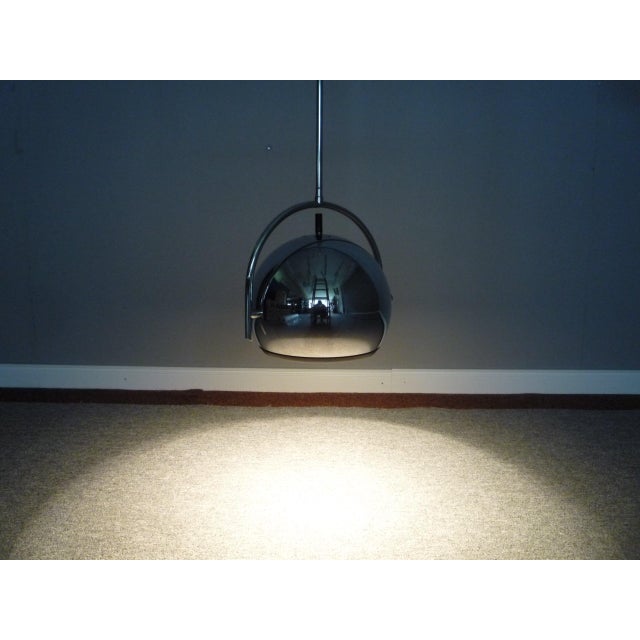 Beautiful chrome hanging lamp from the sixties. In the style of Sarfatti. from first owner and in very good original...