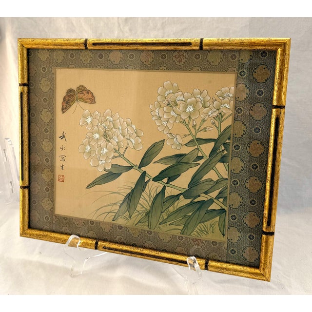 Original Chinese botanical painting featuring white blossoms, soft green leaves, and a delicate butterfly rendered in...