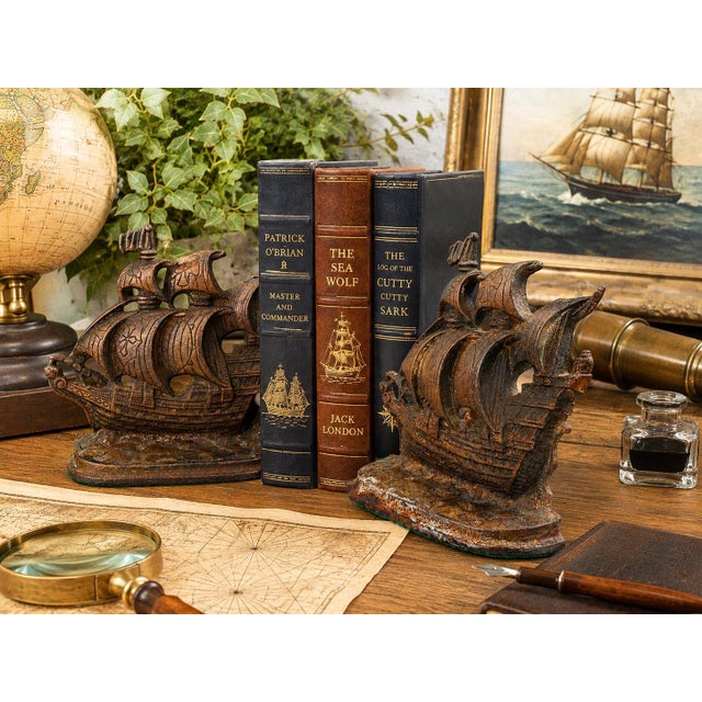 Celebrate the romance of the Age of Sail with this handsome pair of vintage cast iron Elizabethan galleon bookends. Each...