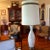 Mid-Century Modern very tall lamp. Design is a modernist textured glaze over a pitted raised ceramic base. Has its...