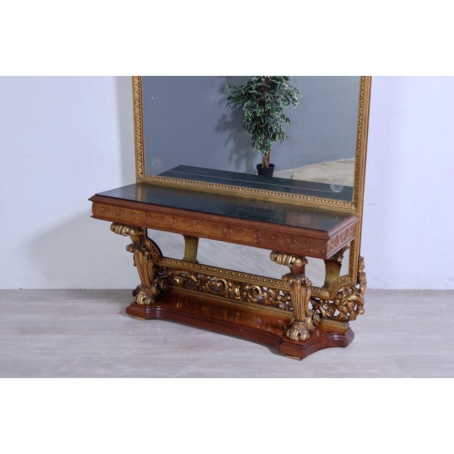 Petineuse toilette production circa 1930s'40s, late Art Nouveau style. Large framed mirror in gilt carved wood. Wooden...