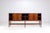 Unusual Danish highboard or sideboard, produced in 1967 and executed in beautifully grained rosewood. The design is...