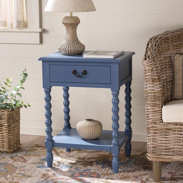 Classic farmhouse charm meets contemporary decor in this Athena Accent Table. Athenas modernized ball-turned legs are...