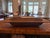 This exceptional antique hand-carved dough bowl is a beautifully preserved example of early farmhouse craftsmanship....
