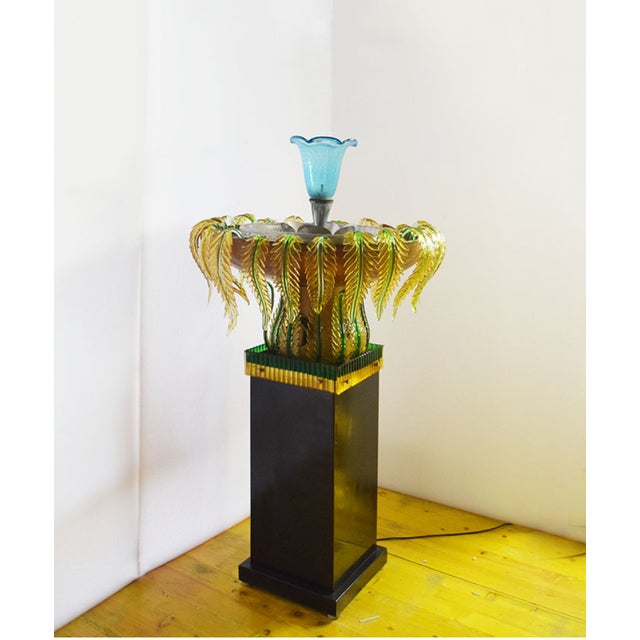 Monumental fountain in Murano glass from the 1950s. Metal base containing pump for continuous water recycling and...